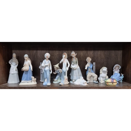 1433 - Two Nao figures; together with other similar figures; etc, largest 26.5cm high. (13)... 