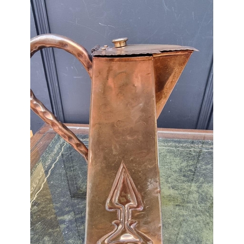 1441 - An Art Nouveau copper jug, 29cm high. 