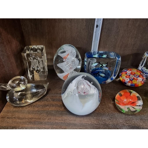 1457 - A collection of glass paperweights. (37)