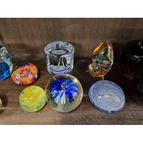 1457 - A collection of glass paperweights. (37)