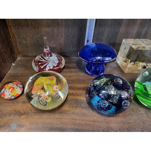 1457 - A collection of glass paperweights. (37)