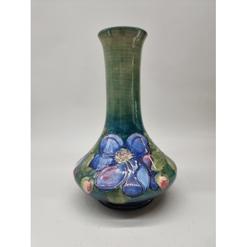 1477 - A Walter Moorcroft 'Clematis' pattern baluster vase, 30.5cm high.