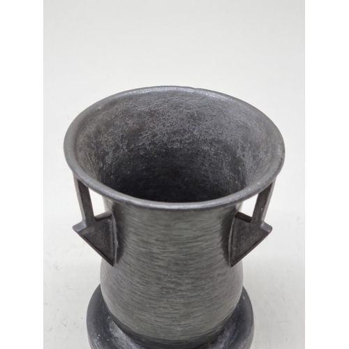 1484 - An unusual Liberty Tudric pewter three handled vase, No.0167, 13.5cm high.