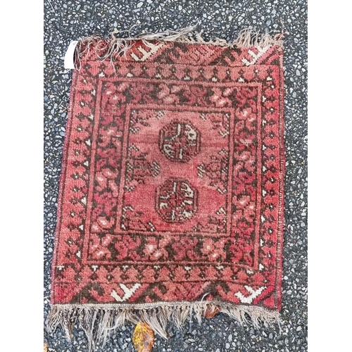 1131 - Four various prayer mats, all on a red ground, largest, 66 x 74cm. 