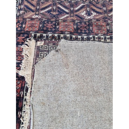 1132 - A pair of Persian rugs, having temple design to central fields, with geometric decoration, 150 x 120... 