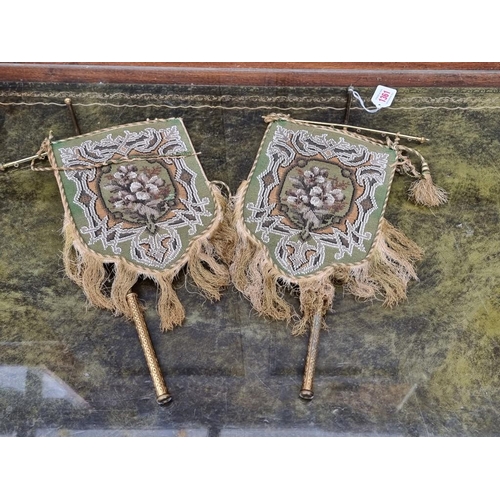 1361 - An unusual pair of Victorian beadwork panels or screens, with fringed edges, on brass mounts, total ... 