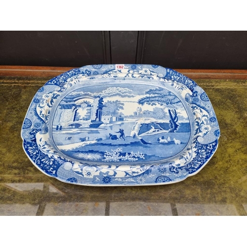 1362 - WITHDRAWN FROM SALE A Victorian blue and white pottery meat plate, 53.5cm wide.