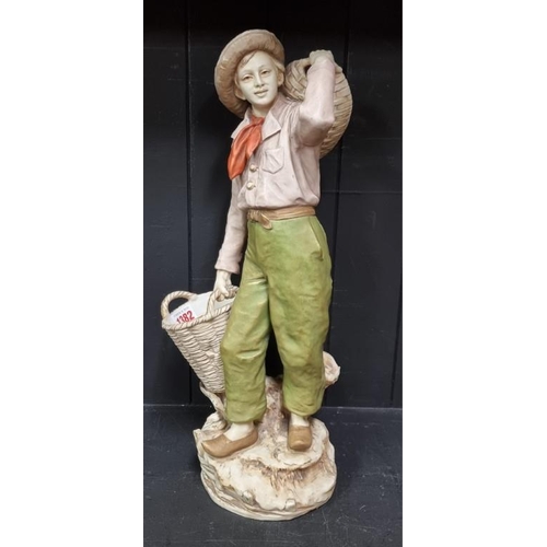 1382 - A large Royal Dux figure of a peasant with baskets, No.1009, 44.5cm high.... 