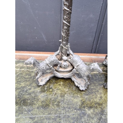 1424 - A pair of bronze tripod candlesticks, 41cm high.