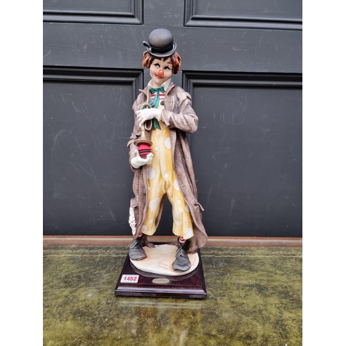 1452 - A large Florence Capodimonte clown, 45cm high, boxed. 