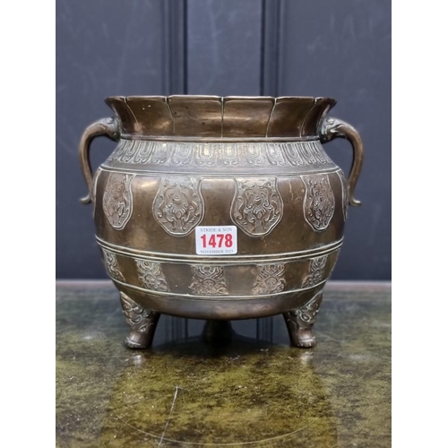 1478 - A Large Chinese bronze twin handled tripod censer, 21.5cm high x 22.5cm diameter.