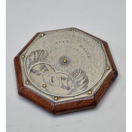 1584 - An unusual Victorian nickel plated and fruitwood octagonal snuff box, the rotating top inscribed 'Pr... 