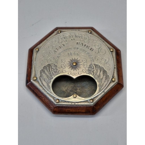 1584 - An unusual Victorian nickel plated and fruitwood octagonal snuff box, the rotating top inscribed 'Pr... 