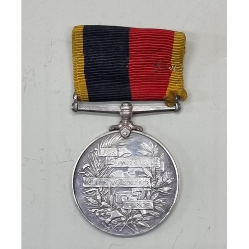 1592 - Medals: an Edward VII Long Service in the Volunteer Force Medal, to 767 Bmbr E. Edwards. H.A.C of Lo... 