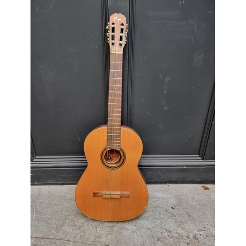 1672 - A BM acoustic guitar, in bag.