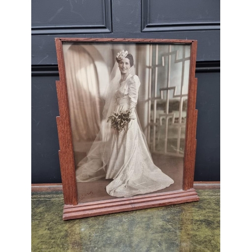 1358 - An Art Deco oak photograph frame, 45.5 x 40cm.