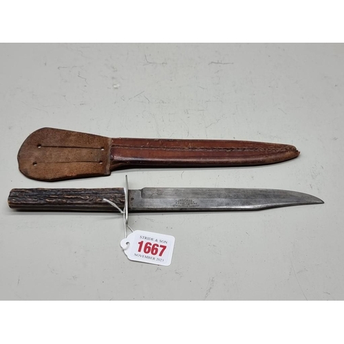 1667 - An antique Bowie knife and leather sheath, the 16cm blade stamped 'George Butler & Co, Trinity W... 