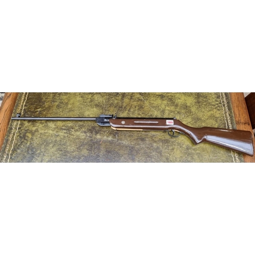 1669 - A Westlake .77 cal air rifle, with brown painted stock.