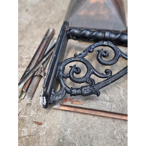 1673 - A Victorian style black painted cast metal wall bracket and coppered lantern, the lantern 35cm wide,... 