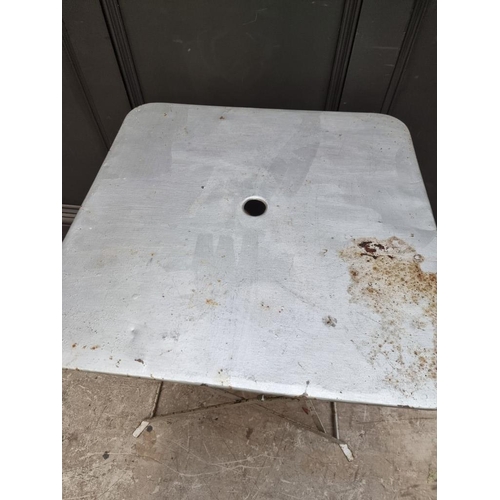 1674 - A vintage silver painted steel folding garden table, 59.5cm wide.