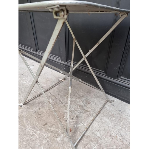 1674 - A vintage silver painted steel folding garden table, 59.5cm wide.