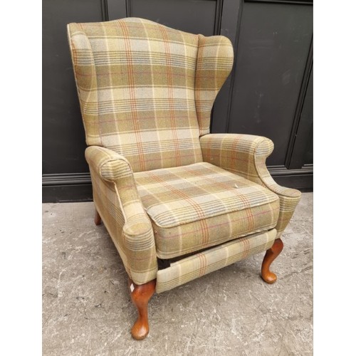 1078 - A Parker Knoll armchair, (s.d. to foot mechanism).