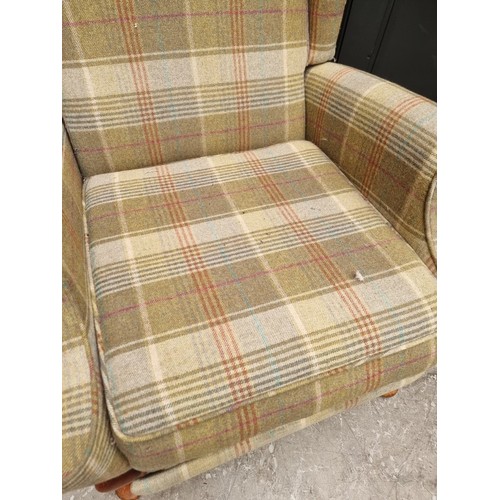 1078 - A Parker Knoll armchair, (s.d. to foot mechanism).