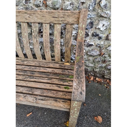 1118 - A teak garden bench, 149cm wide.