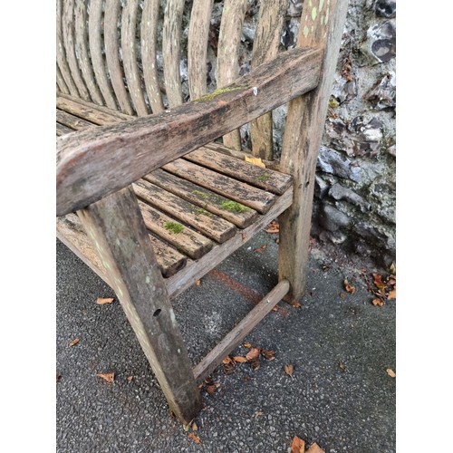 1118 - A teak garden bench, 149cm wide.