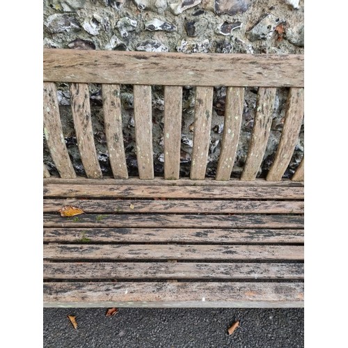 1118 - A teak garden bench, 149cm wide.