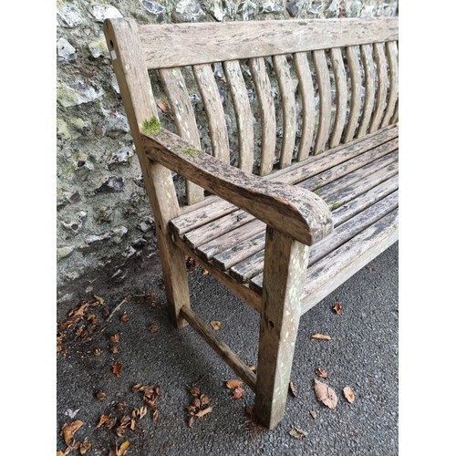 1118 - A teak garden bench, 149cm wide.