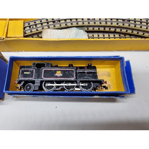 110 - Hornby Dublo: a boxed electric train set No. EDG17; together with a locomotive EDL18, British R... 