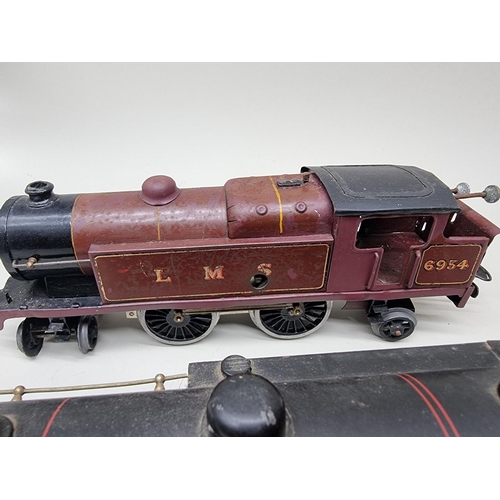 111 - Bassett-Lowke: a vintage 0 gauge locomotive No.5374; together with three similar locomotives by... 