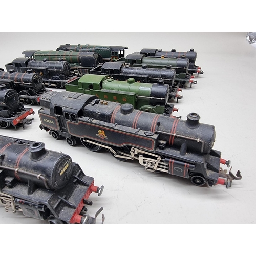 122 - Hornby: eleven vintage 00 gauge locomotives, to include: Duchess of Montrose (x2); No.80054 (x2... 