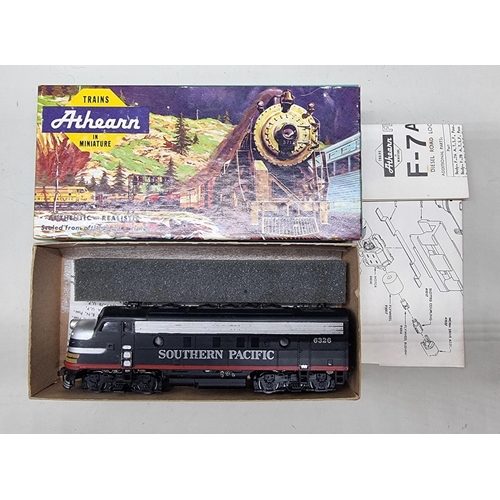 123 - Athearn: a group of nine boxed locomotives, some repaints and incorrect boxes.