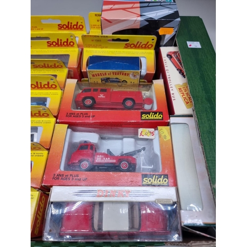 148 - Solido: a group of thirty-six 1/43 scale vehicles, all boxed; together with a few other example... 