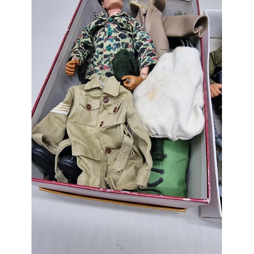 15 - Action Man: a 1964 issue Palitoy Action Man figure with a collection of uniform and accessories; tog... 