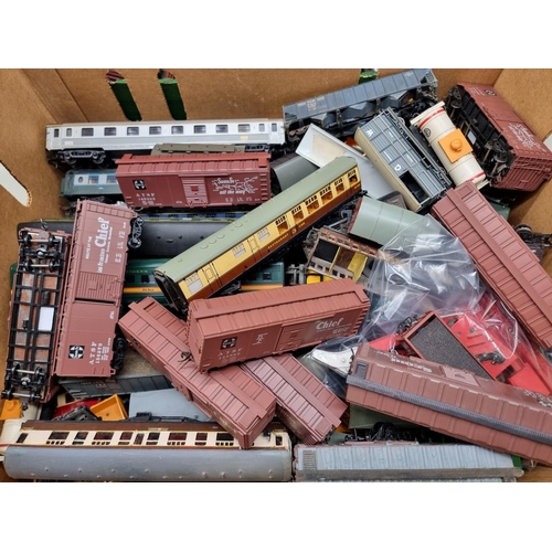 155 - Hornby Dublo: a large quantity in two boxes of various coaches, wagons, tankers and freight tru... 