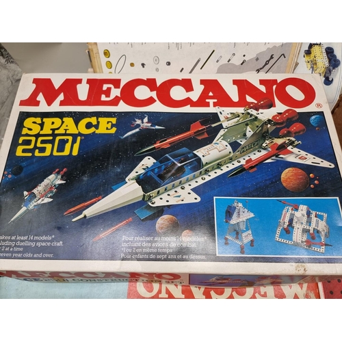 164 - Meccano: six vintage Meccano kits, to include Space 2501 and five others; together with a group of a... 