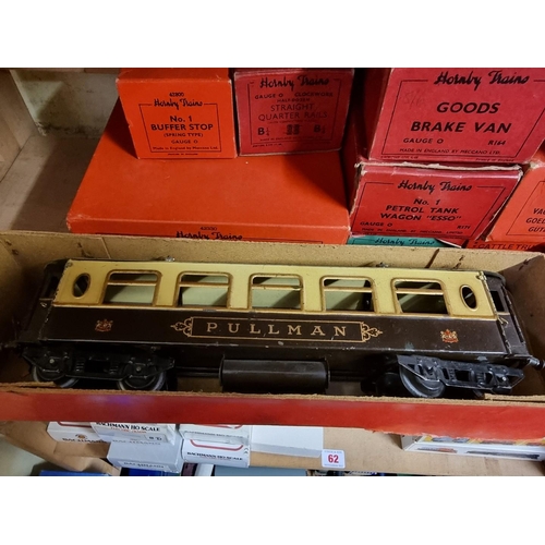 61 - Hornby 0 Gauge: a collection of twelve boxed wagons and similar, to include a No.2 Pullman coac... 