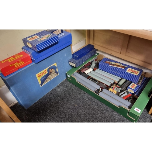 63 - Hornby Dublo: a group of railway carriages and locomotives, to include a T.P.O. Mail Van Set, an EDL... 