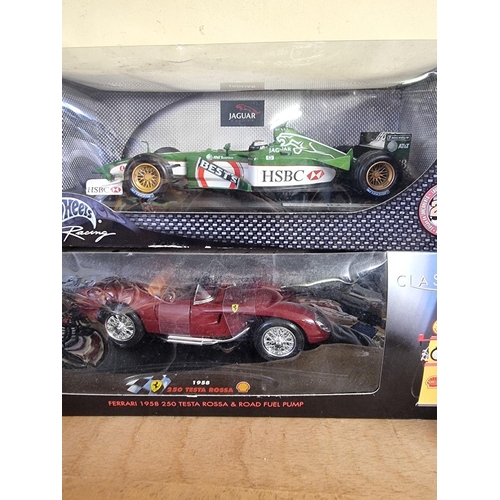 64 - Hot Wheels: a Racing No:50173 Eddie Irvine; together with a Mira 1955 Buick ; together with nin... 