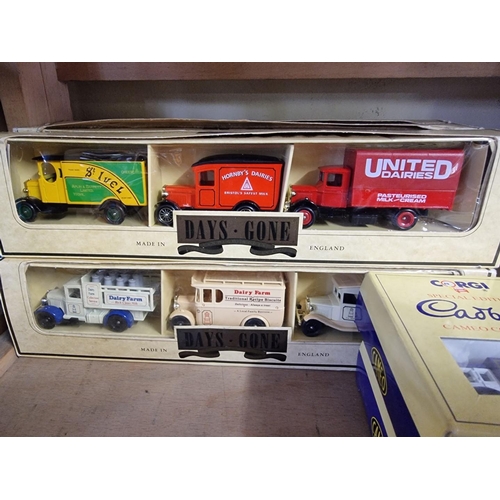 65 - Corgi: a collection of boxed vehicle sets, to include 'The Whitbread Collection'; and 'The Grocery S... 