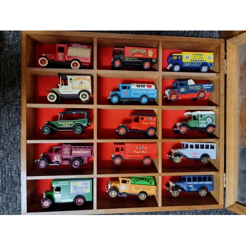 66 - Diecast: a group of various scale boxed diecast vehicles, to include Ertl; together with two sm... 