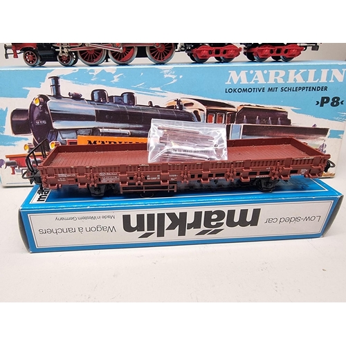 7 - Marklin: a boxed locomotive and coal wagon, No.8398; together with a similar low sided car, No.... 