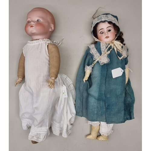 74 - Dolls: an Armand Marseille bisque head baby doll, with blue sleeping eyes and cloth body, (losses to... 