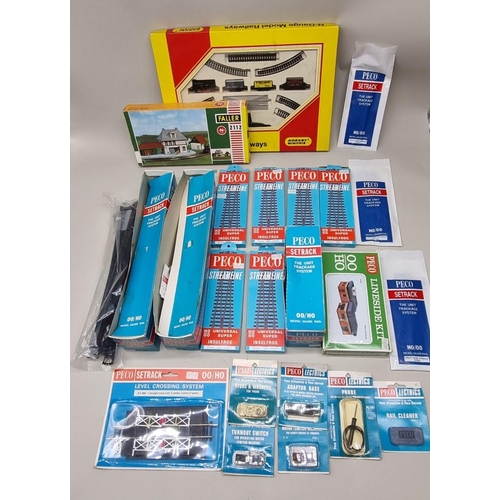 87 - Hornby: N-Gauge: a Minitrix N.101 goods set, boxed; together with a Faller 2112 model kit; and a col... 