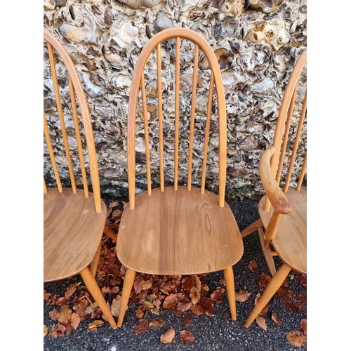 1010 - A set of six vintage Ercol 'Quaker' dining chairs, to include a pair of elbow chairs.... 