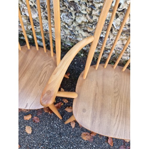 1010 - A set of six vintage Ercol 'Quaker' dining chairs, to include a pair of elbow chairs.... 