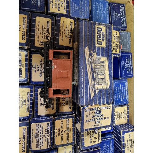 142 - Hornby Dublo: a collection of vintage (blue box) wagons, to include Shell and Esso petrol tanks... 